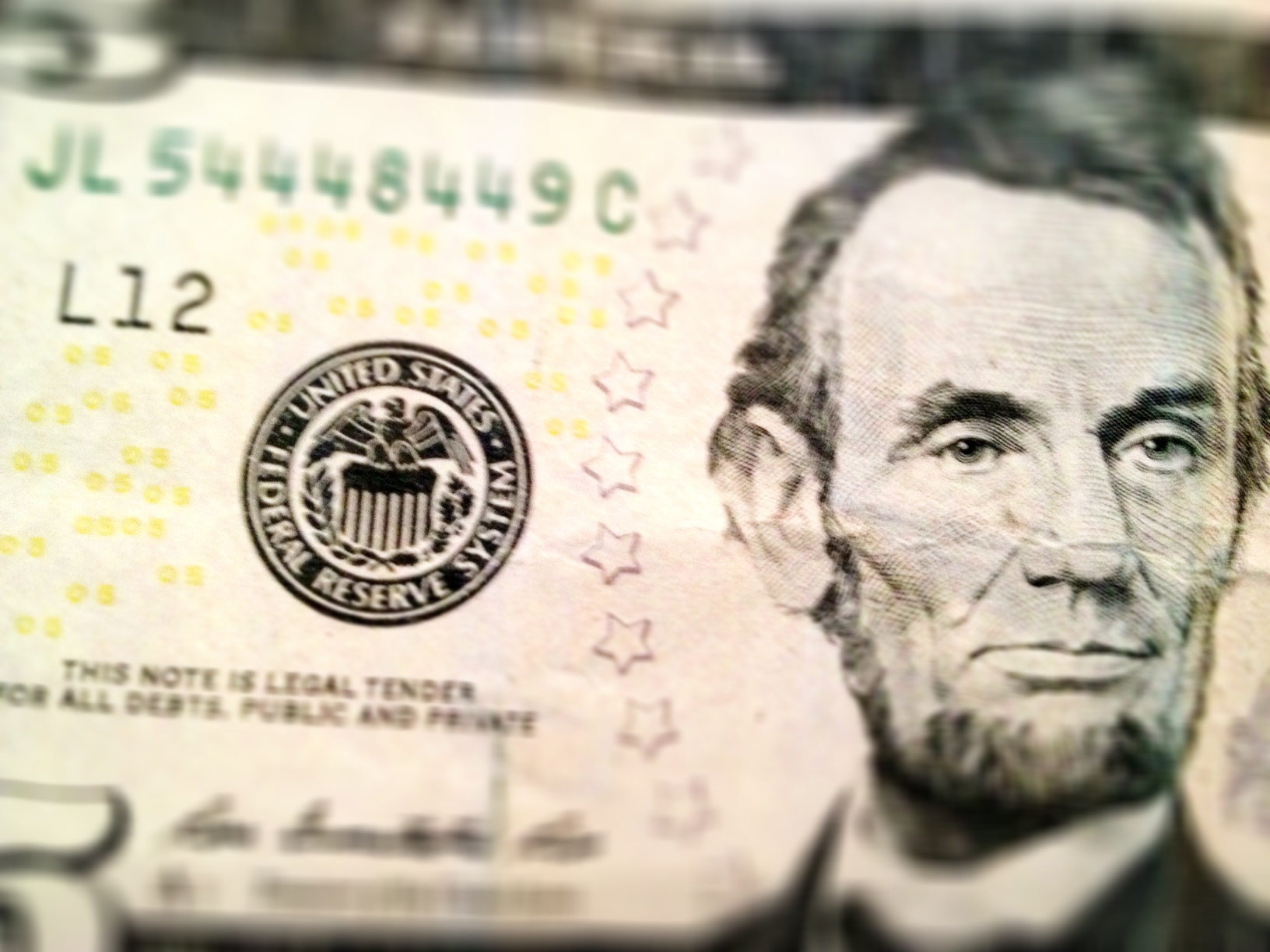 Photo of five dollar bill